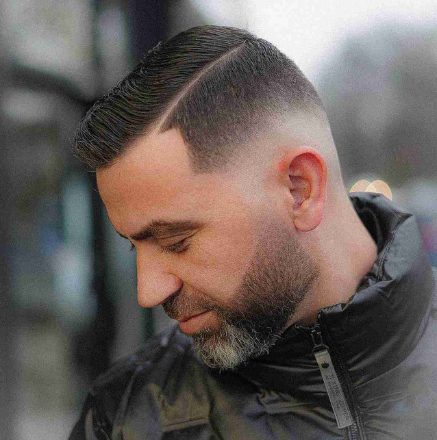 High fading with fine hard part Haircut style for men